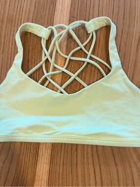 Lululemon Soft Neon Yellow strappy back sports bra